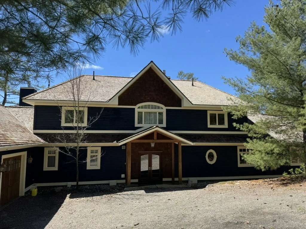 Roof Cleaning in progress at a Gravenhurst property