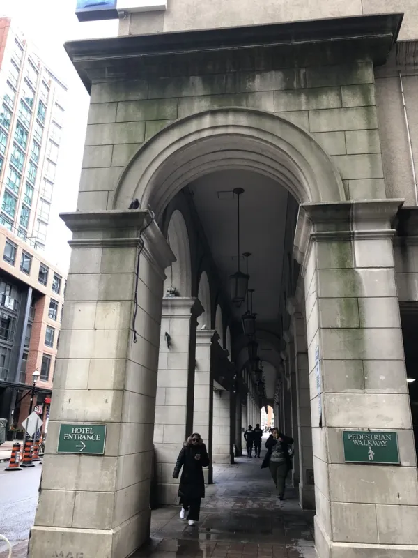 Weathered stone walkway before exterior cleaning in Hamilton